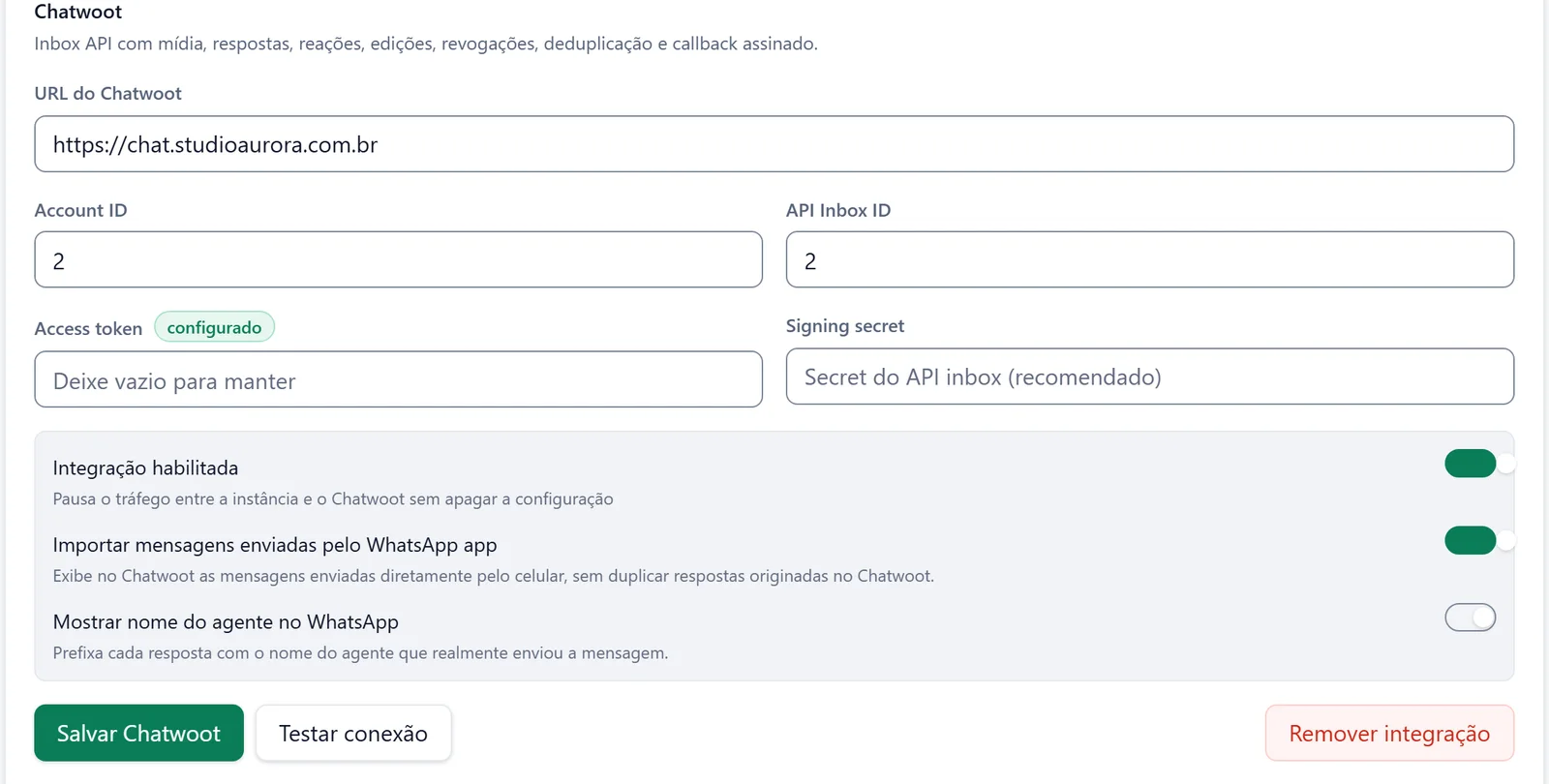 Tela Chatwoot nativo no painel da WPPAPI: campos de URL, Account ID, API Inbox ID, access token e signing secret, com as opções de importar mensagens do celular e mostrar o nome do agente.